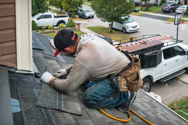 Professional Roofing technician working in Stafford, NY